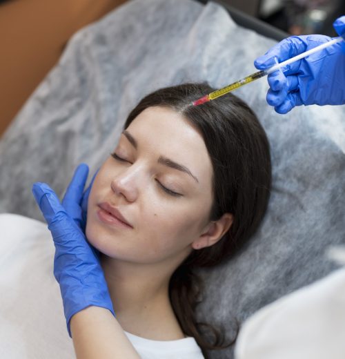 young-woman-getting-prp-injection-high-angle